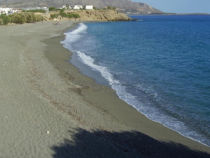 A sandy beach at Makry Gialos. - A sandy beach at Makry Gialos.